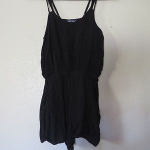 Black romper w pockets and adjustable straps SM